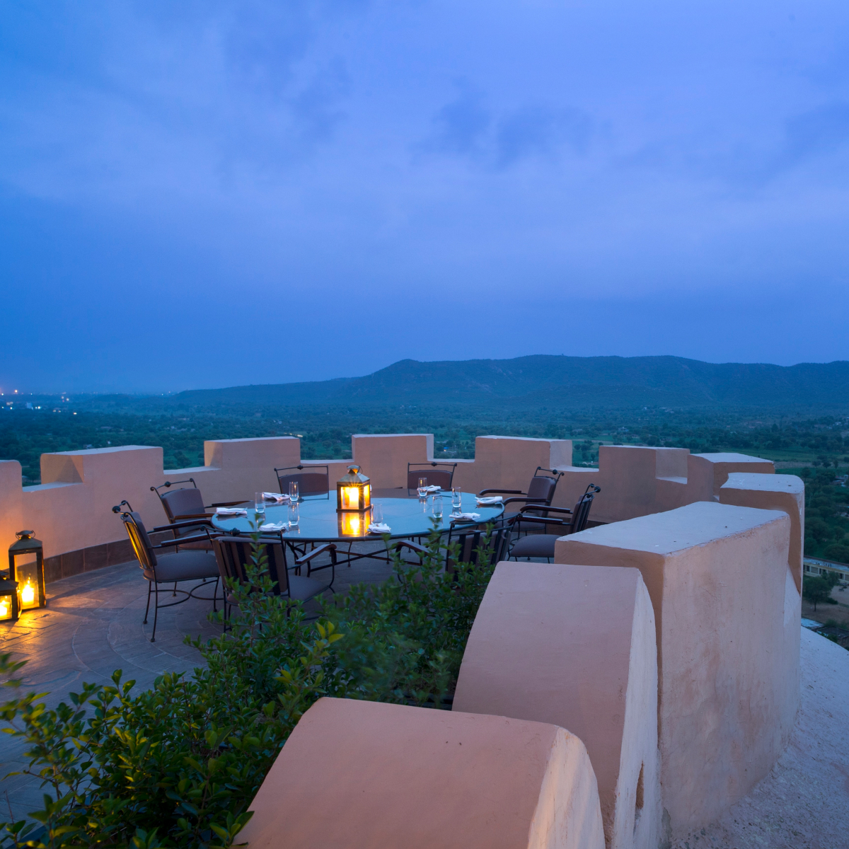 outdoor round table with candle in center